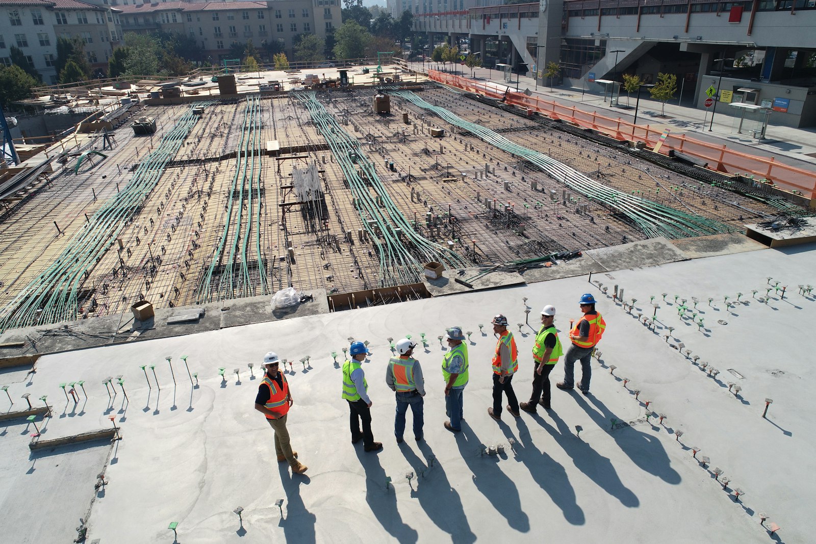 Home improvement specialists reviewing on-site progress
